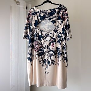 Taylor dress, peek-a-boo opening at back, 3 buttons and zipper, sheath